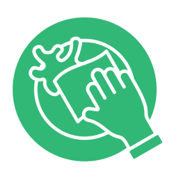 Hand holding a globe with a heart shape on it.