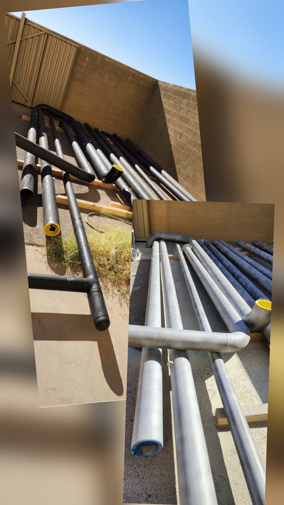 Several metal pipes laid out on a wooden surface.